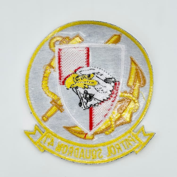 Embroidered VP-47 Golden Swordsmen squadron patch with iron-on backing.