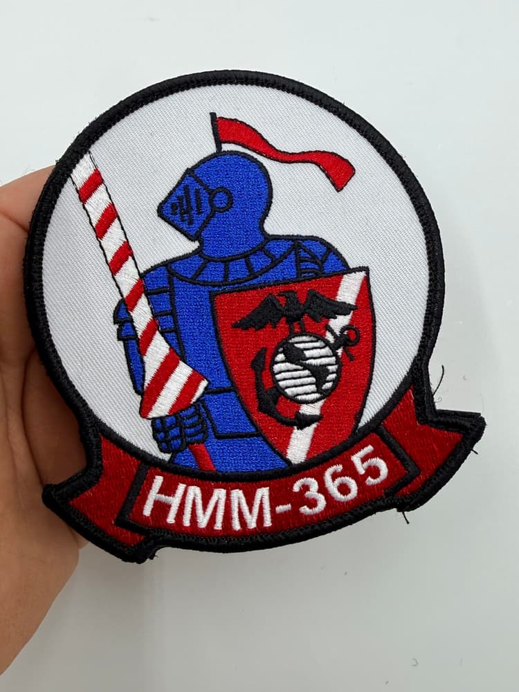 HMM-365 Blue Knights hook-and-loop patch, front in hand view