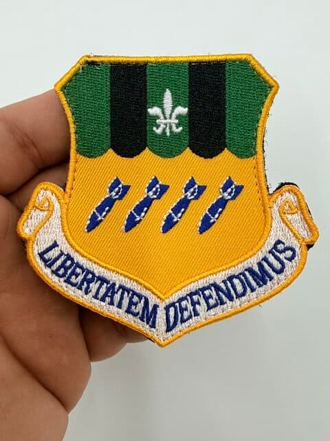 2nd Bomb Wing Libertatem Defendimus hook-and-loop patch, front in hand view