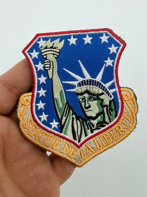 48th Tactical Fighter Wing Statue de la Liberte hook-and-loop patch, front in hand view